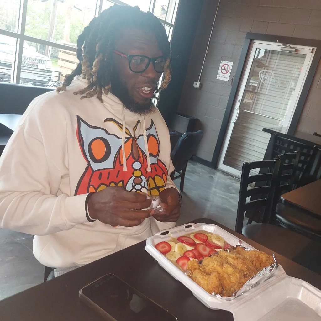 French toast topped with fresh strawberries and banana slices